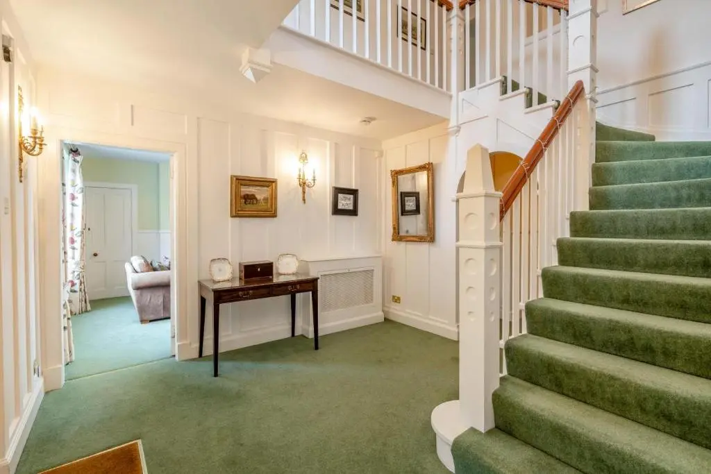 a staircase in a home with a green floor at 7 Bed in Strathdon oc-t30594 in Strathdon