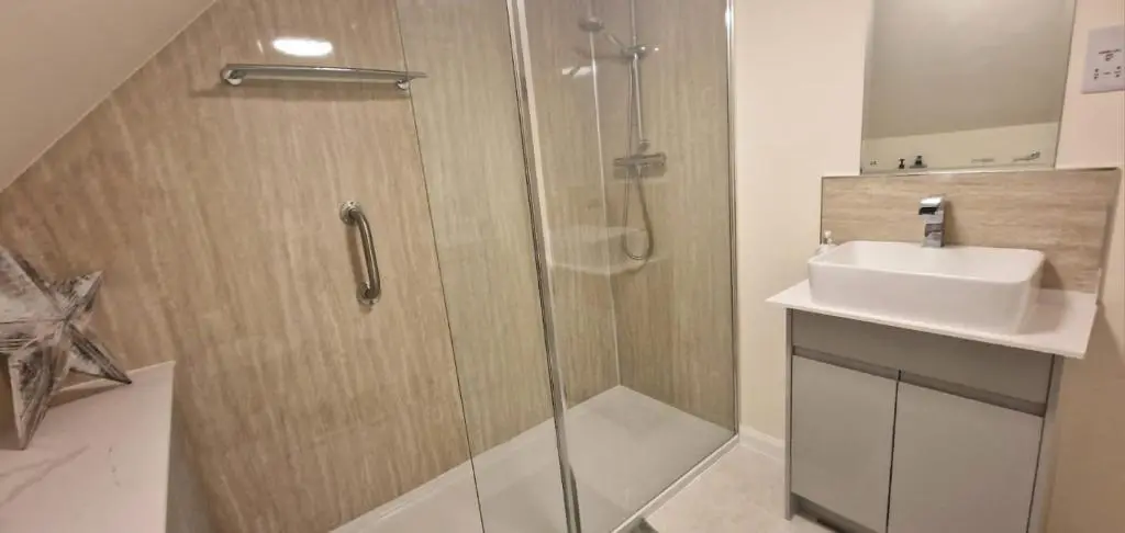 a bathroom with a shower and a sink at North Coast Property - Avoch Beach House - Luxury house with sea views in Avoch