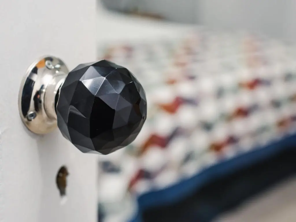 a close up of a door knob in a store at Holiday Home Loch Ness Granary by Interhome in Invermoriston