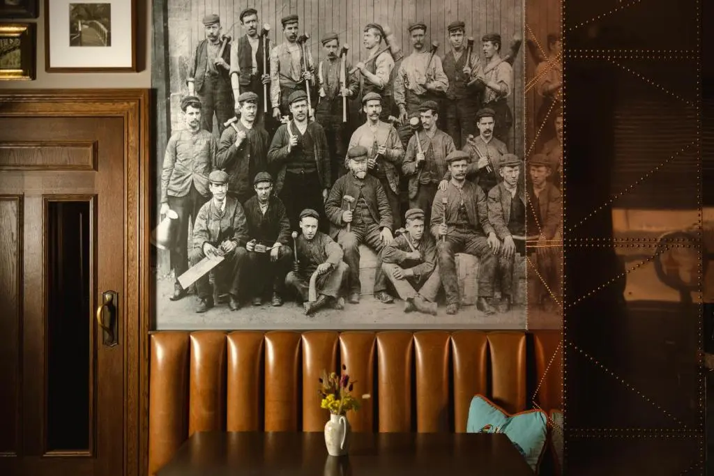 a black and white picture of a baseball team at The Station Hotel in Rothes