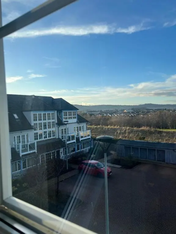 a view from a window of a house at Castlefield Penthouse in Inverness