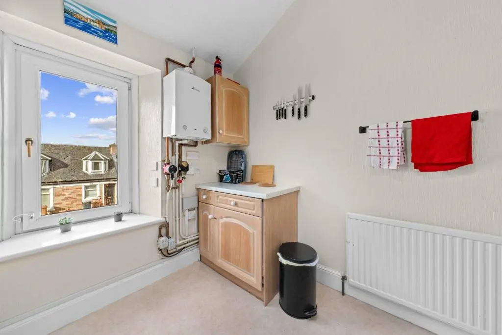 a kitchen with a sink and a window at Central 1 Bedroom Apartment - Inverness in Inverness