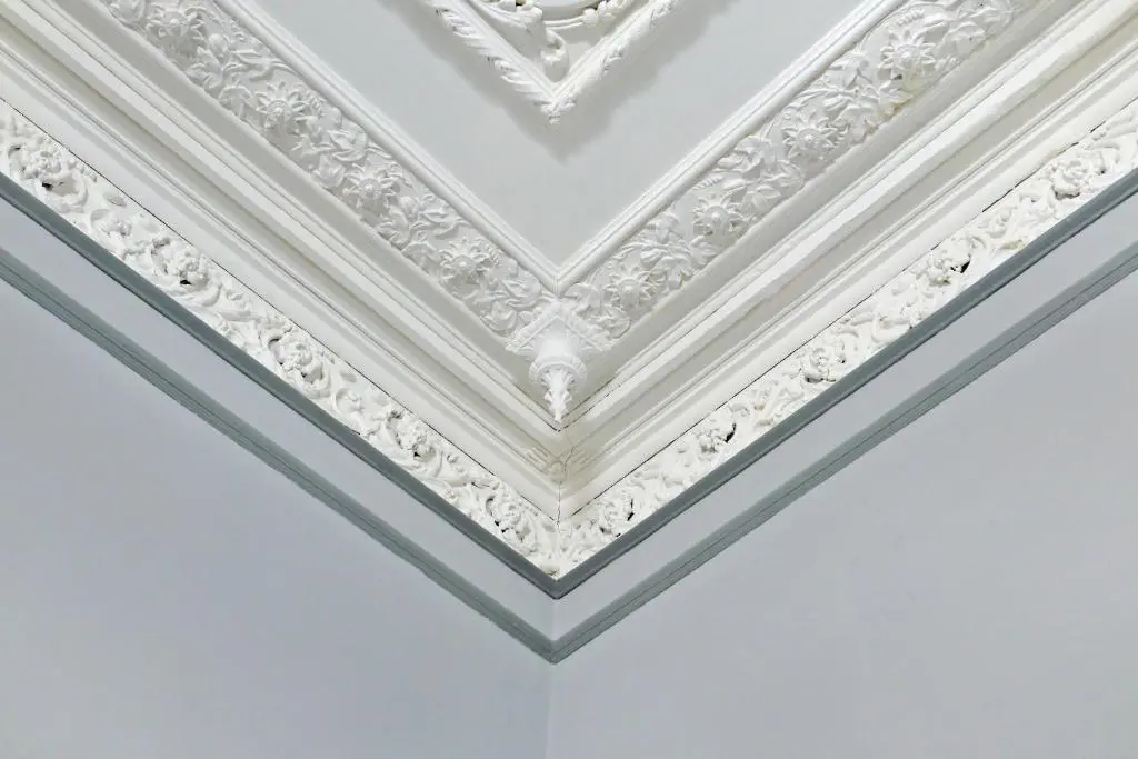 a white coffered ceiling with a heart pattern at Kirkton House in Kirkton of Skene