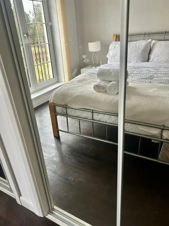 a bedroom with a bed and a window at Luxury 2 bedroom apartment in Aberdeen in Kirkton of Skene