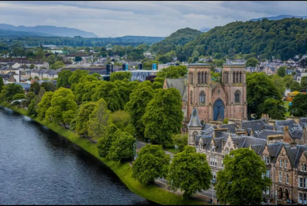 an old building on a island in the water at Royal Apartment in Inverness