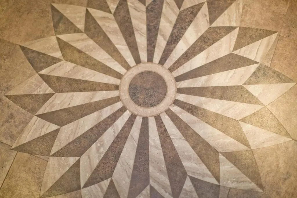 a close up of ailed floor with a circle in the middle at The Invergarry - Royal Deeside Luxury 5 star Couples Retreat with Hot Tub, Aboyne in Aboyne
