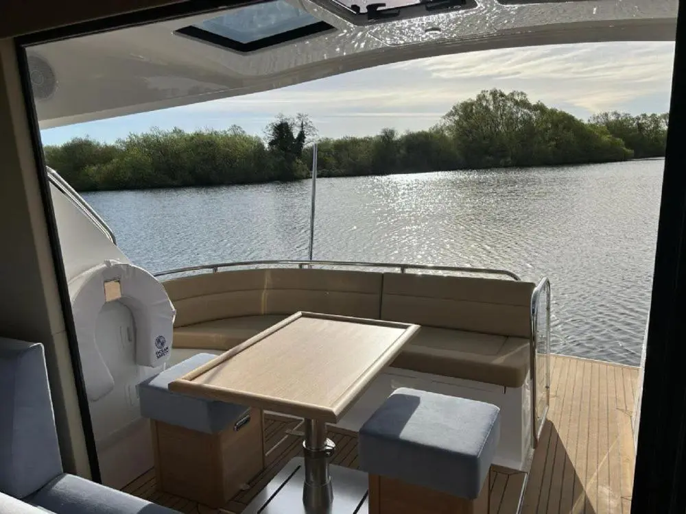 a view of the back of a boat with a table at Islay Class 2 in Inverness