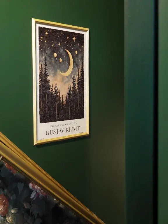 a picture of a starry night on a green wall at Old Manse of Craggan in Glenlivet
