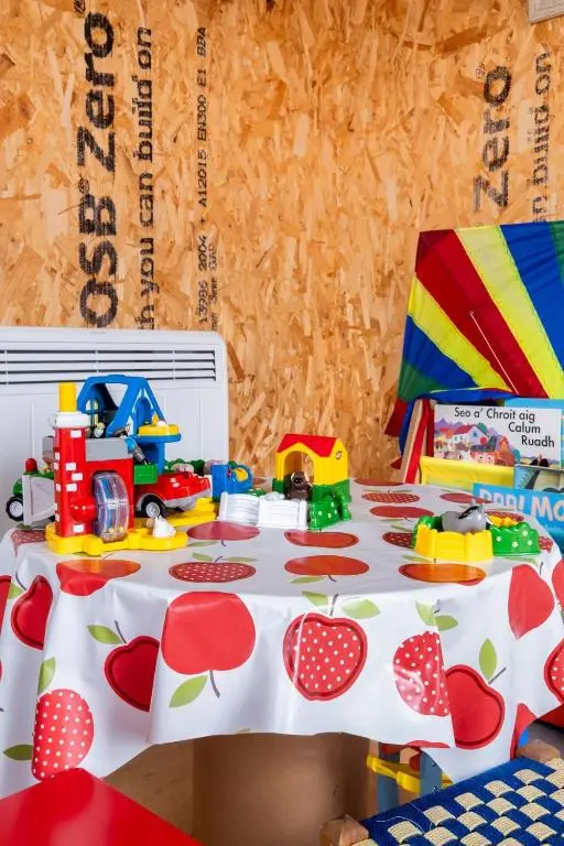 a table with toys on top of it at Luxury Pod 3 in Bonar Bridge