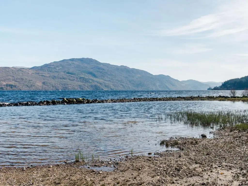 a body of water with mountains in the background at Holiday Home Farmburn by Interhome in Invermoriston
