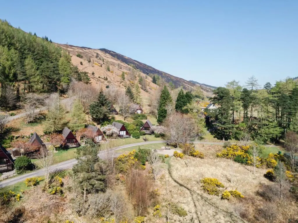 an aerial view of a village with a mountain at Chalet Sandpiper Lodge by Interhome in Spean Bridge
