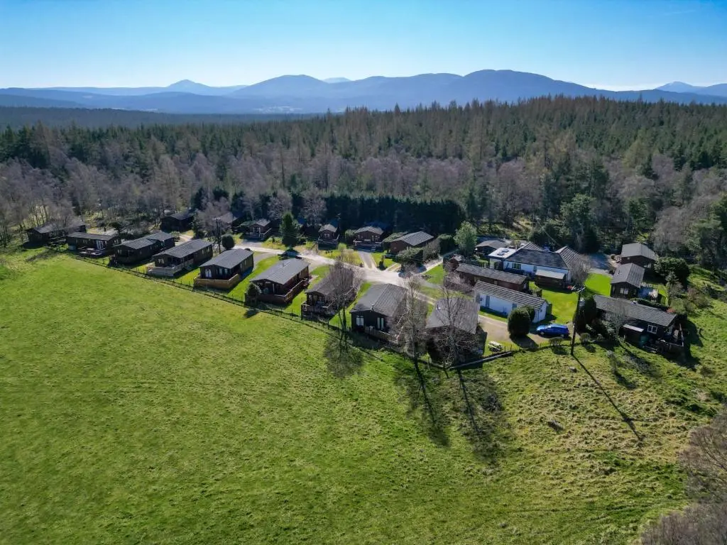 an aerial view of a group of homes in a field at Chalet Lodge 3 by Interhome in Boat of Garten