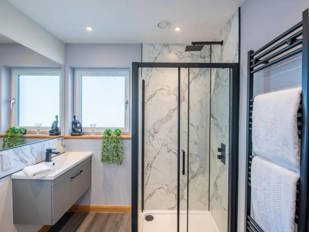 a bathroom with a shower and a sink at Apartment Shore Street by Interhome in Lossiemouth