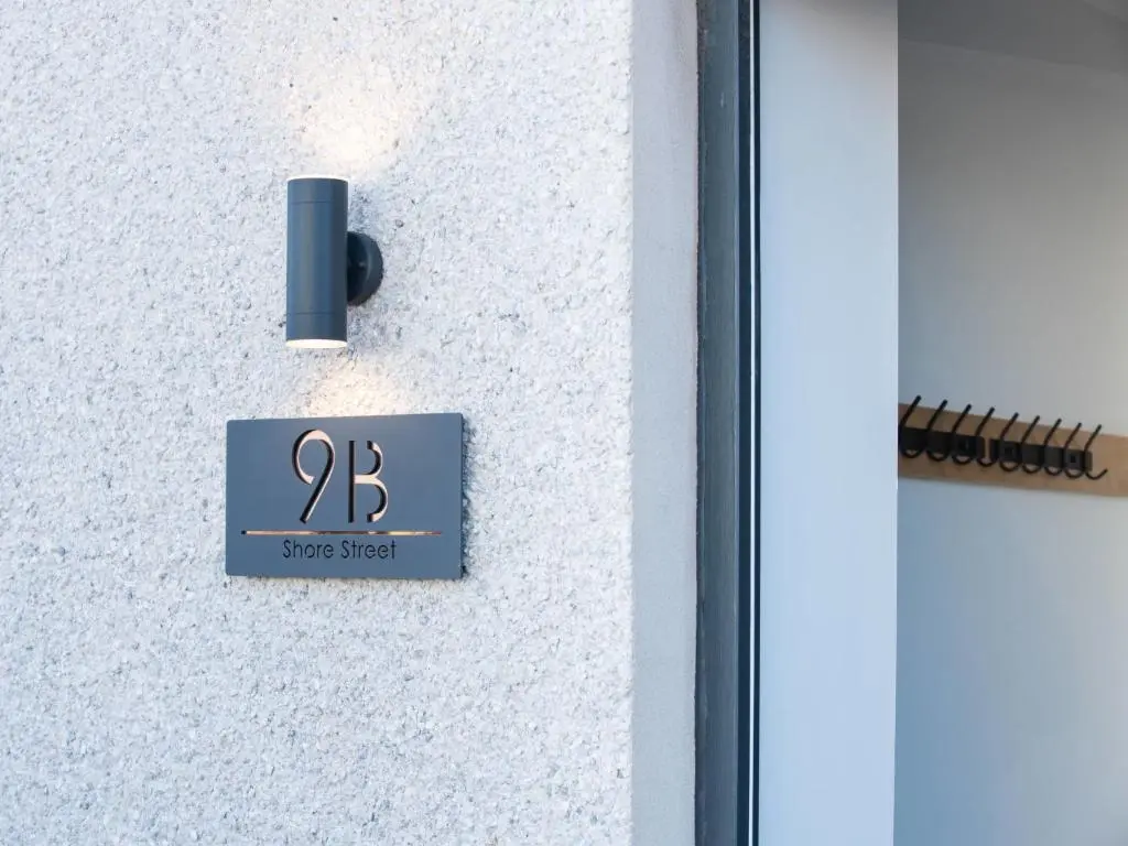a door with a sign that reads gate street at Apartment Shore Street by Interhome in Lossiemouth