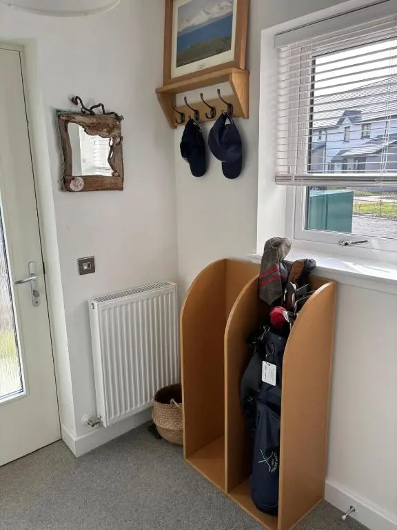 a room with a counter with bags and a window at Gorgeous Dornoch apartment in Dornoch