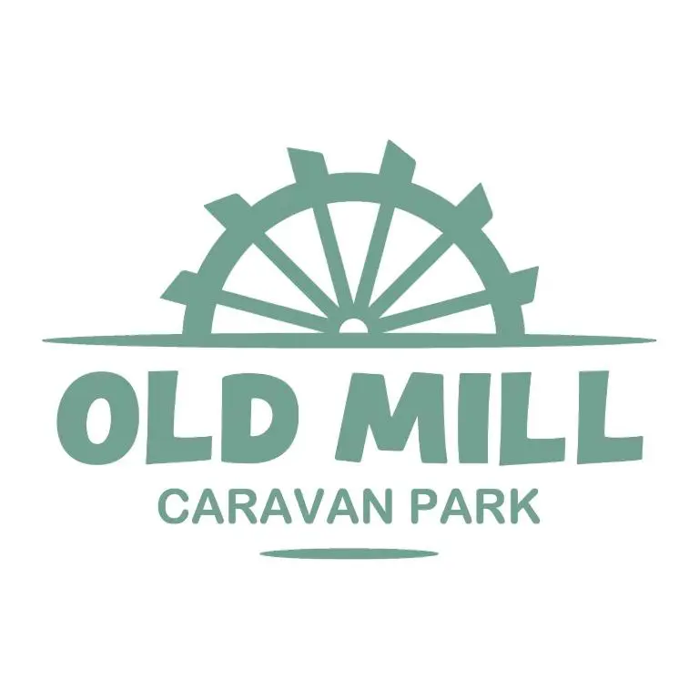 a logo for old mill caravan park at C5, The Old Mill Caravan Park, Brodie in Dyke