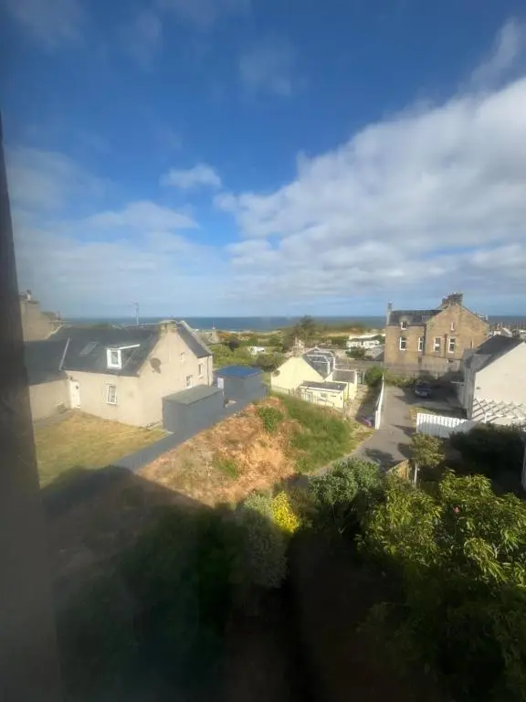 a view from a window of a house at Harbour View Hopeman in Hopeman