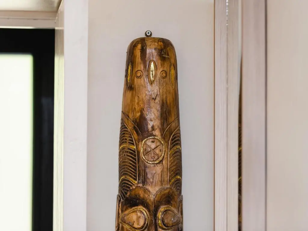 a wooden vase hanging on a wall at Holiday Home Betty's Bothy by Interhome in Drumnadrochit