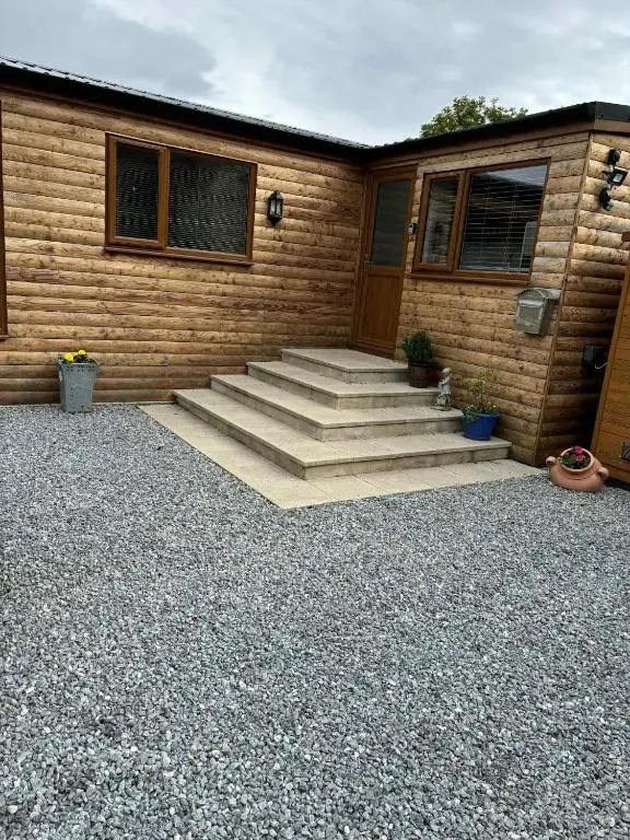 a patio with stairs in front of a house at Fairview Workers Accommodation in Elgin