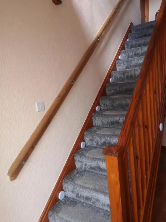 a set of stairs in a building at Gladstone Cottage in Inverness