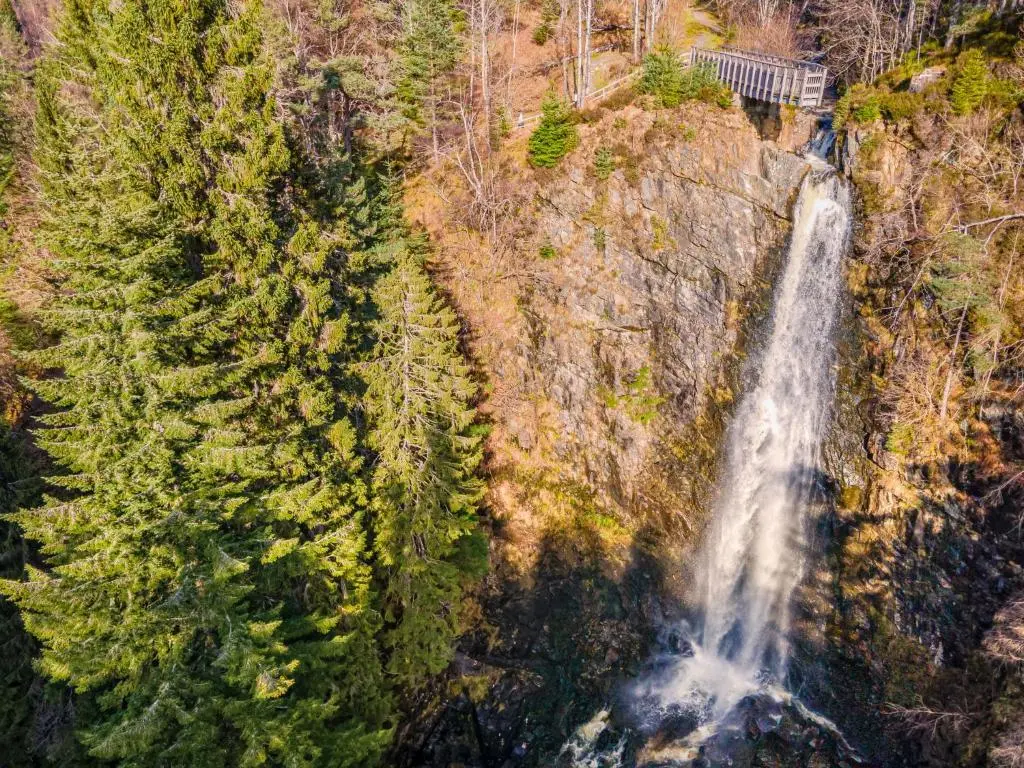 an aerial view of a waterfall on the side of a mountain at Holiday Home Shepherds Hut by Interhome in Balnain