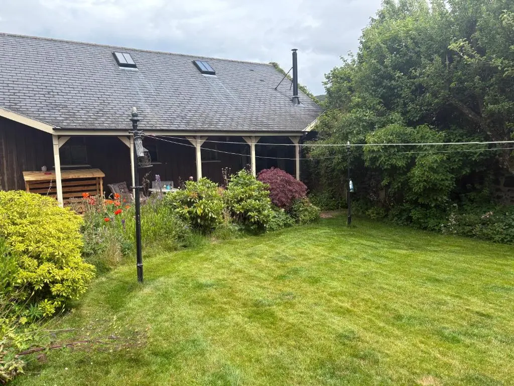 a house with a yard with a yard at The Studio at Rannagowan in Ballater