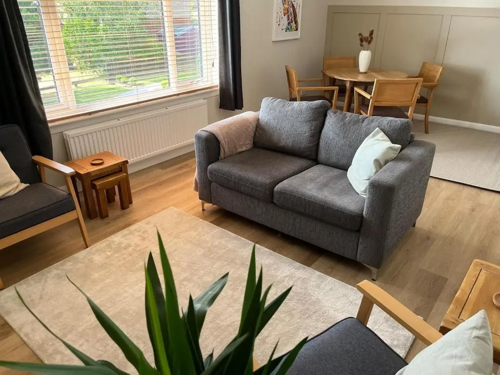 a living room with a couch and a table at Covesea Horizon in Elgin