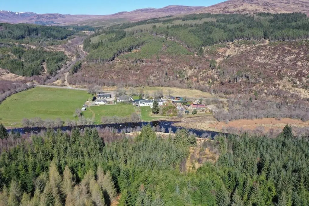 an aerial view of a village in the mountains at Tonita in Garve