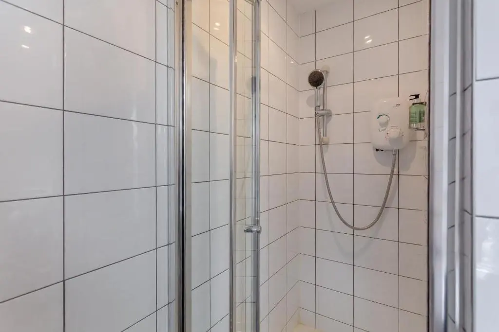 a shower in a bathroom with a shower at 3 Bed in Newtonmore oc-h32416 in Newtonmore
