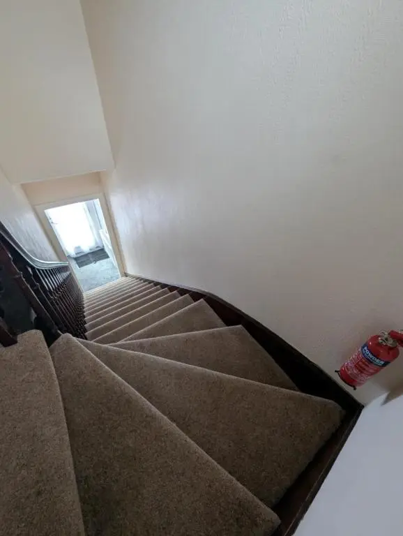 an empty stairway in a room with some stairs at Foggiehoose based near Turriff Huntly Banff in Aberchirder