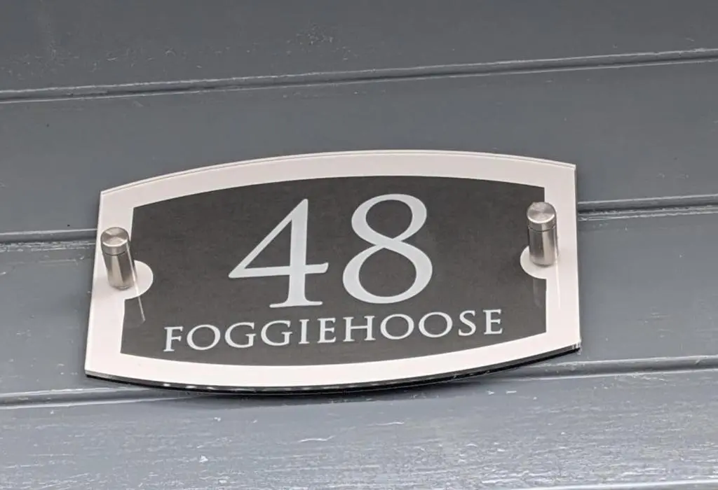 a plate with the number hooked up to a door at Foggiehoose based near Turriff Huntly Banff in Aberchirder
