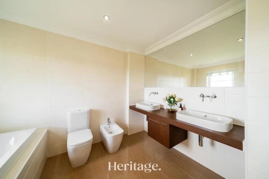 a bathroom with a toilet and a sink and a tub at Bonnieview House, Tarves, Aberdeenshire