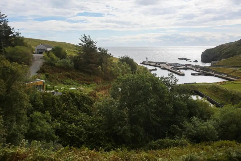 a view of a body of water from a hill at Fishers Rest in Lybster