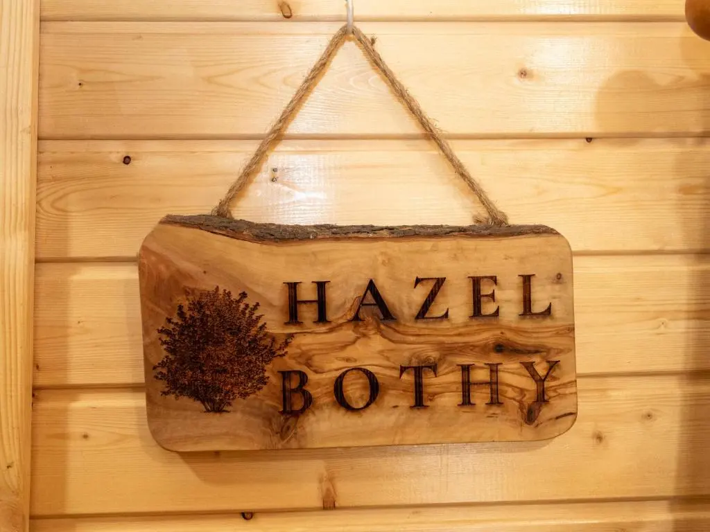 a sign that saysazelothoth hanging on a wall at Apartment Hazel Bothy by Interhome in Coldstone