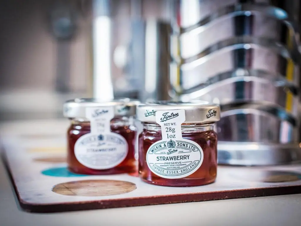 two jars of honey sitting on a counter at Holiday Home Highland Cottage by Interhome in Drumnadrochit