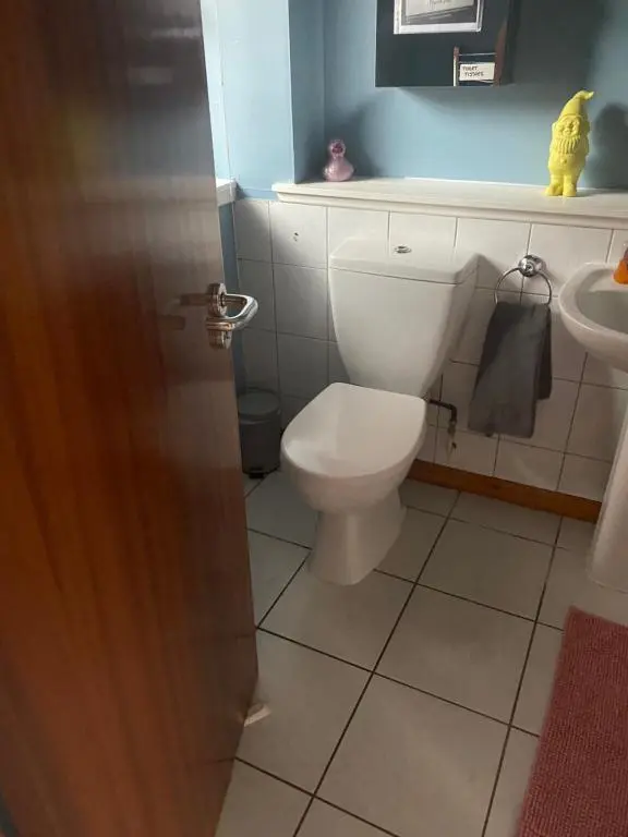 a bathroom with a toilet and a sink at Church st 48B in Inverness
