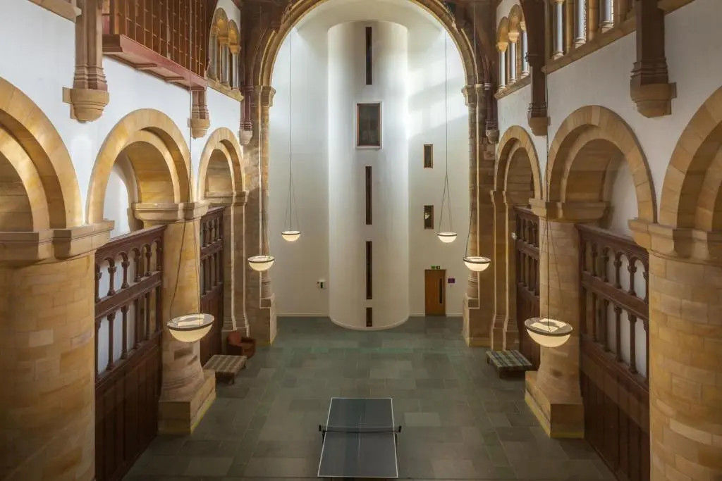 a hallway in a building with sinks in it at Abbey Church 20 in Fort Augustus