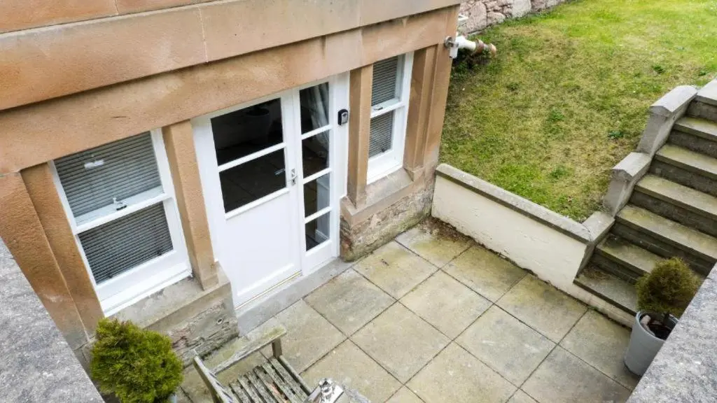 an aerial view of a building with a white door at The Bunker Self Catering in Nairn