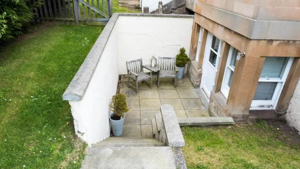 an aerial view of a patio with a table and chairs at The Bunker Self Catering in Nairn