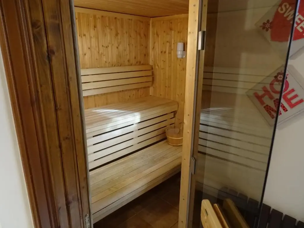 a wooden sauna inside of a room at 'Le Studio' in Inverness