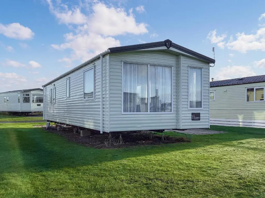 a small silver trailer parked in a yard at A Stone's Throw in Lossiemouth