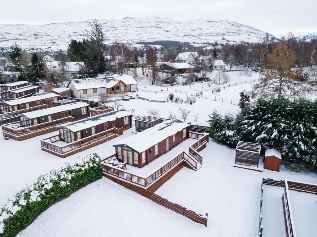 an aerial view of a village in the snow at Holiday Home ScottishHighlands-LochNess by Interhome in Fort Augustus