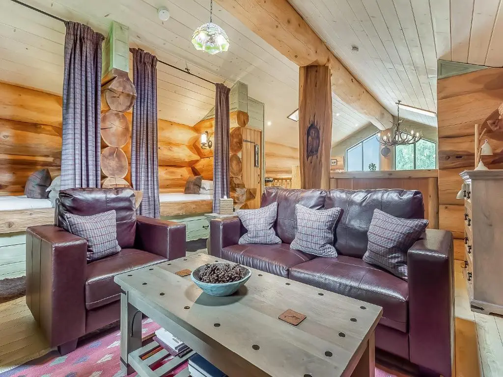 a living room with a couch and a table at Cinclus - Uk50066 in Struy