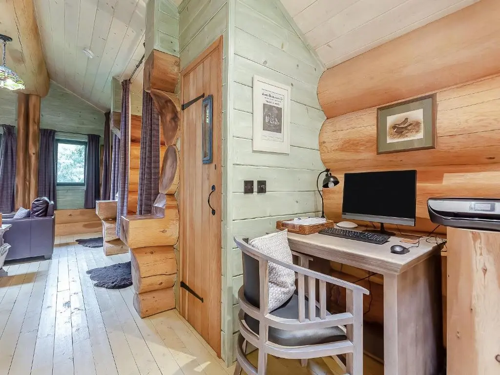 a desk with a computer in a tiny house at Cinclus - Uk50066 in Struy