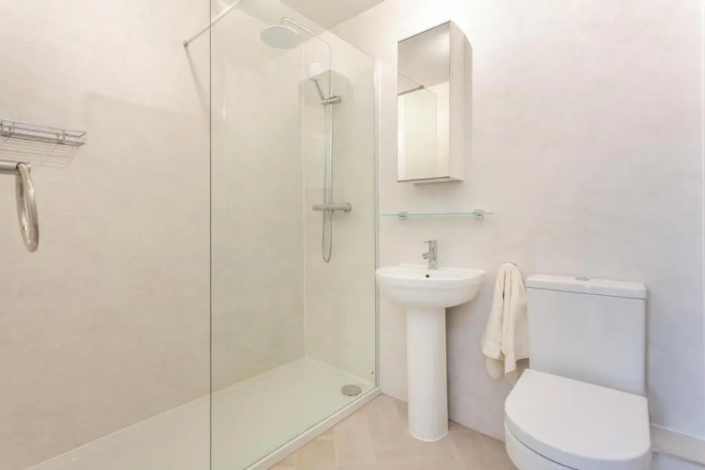 a bathroom with a shower and a toilet and a sink at 2 Bed in Nairn oc-t34496 in Nairn