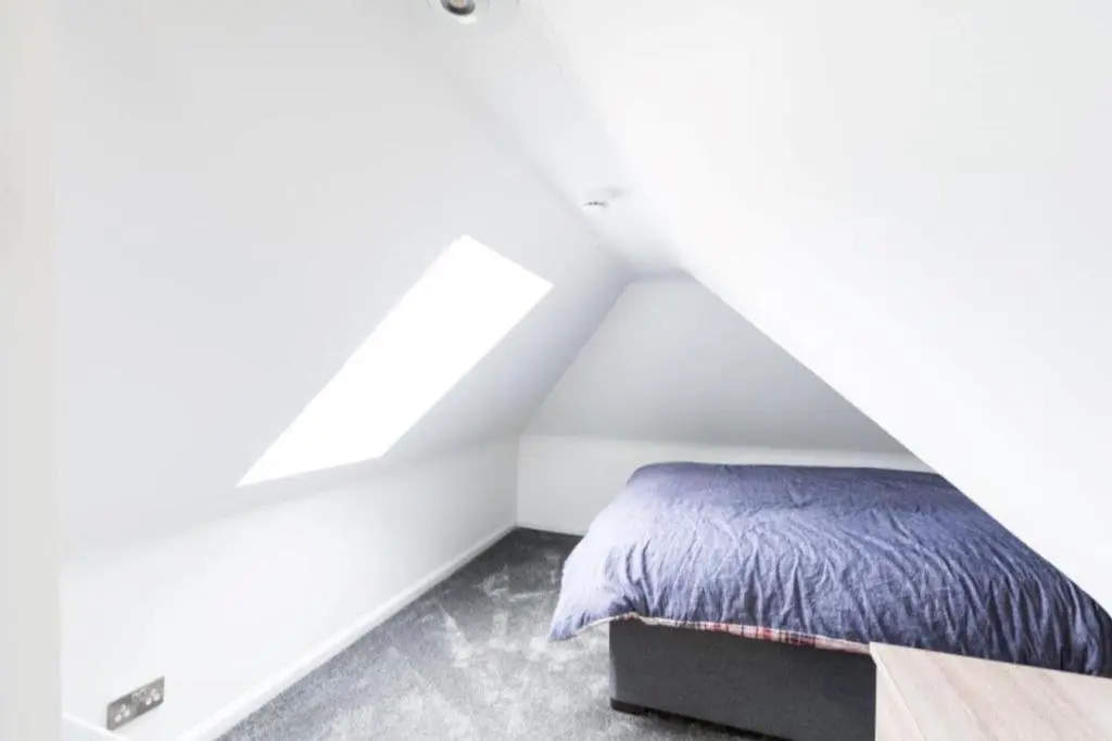 a bedroom with a bed in a attic at Josies House in Banff