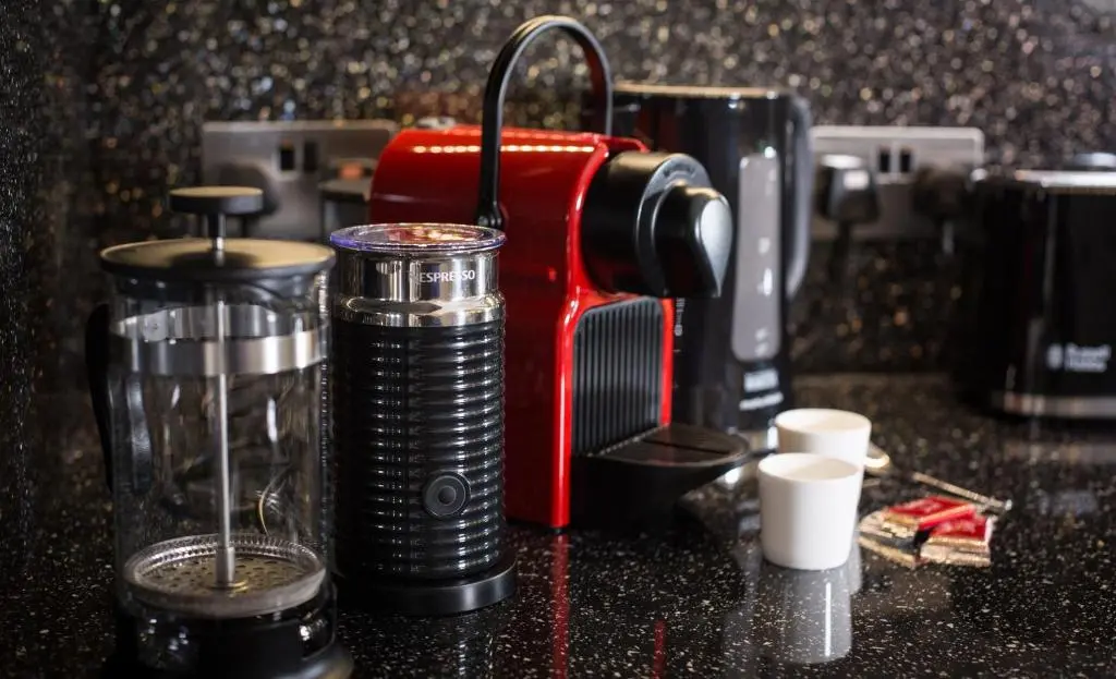 a coffee maker sitting on top of a counter at Glenmoriston Town House Apartments in Inverness