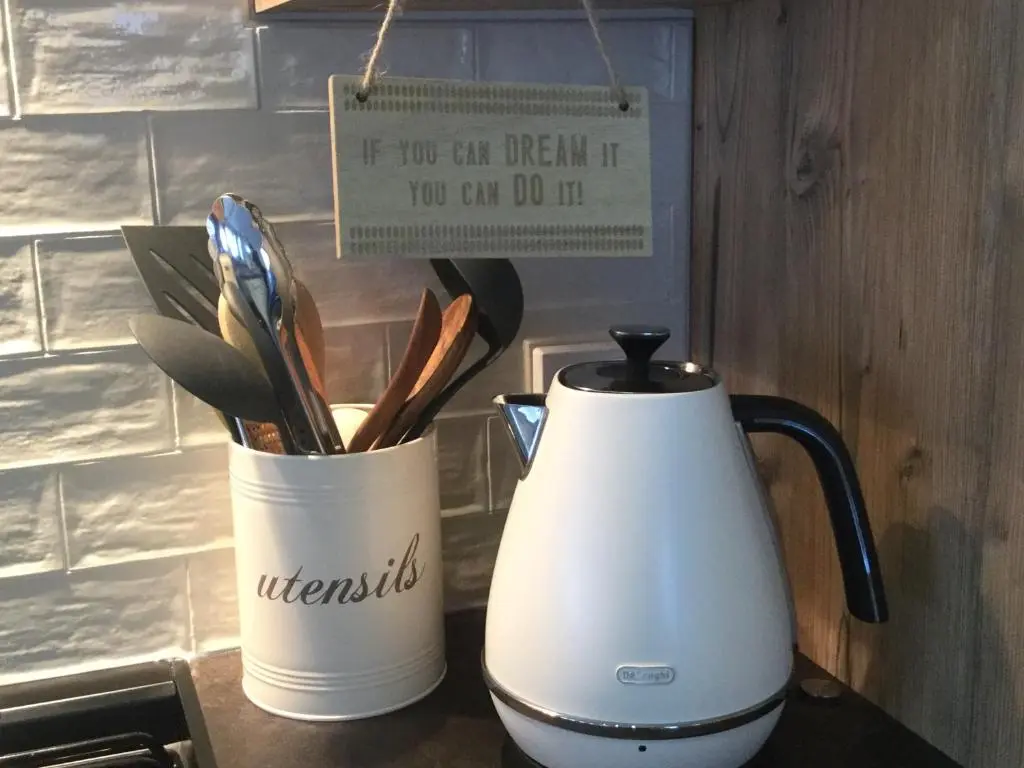 a coffee maker and a tea kettle on a counter at Dunroamin Lodge in Aviemore