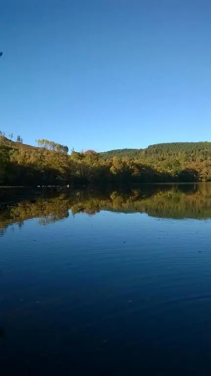 a view of a large body of water at Lochview Guesthouse in Contin