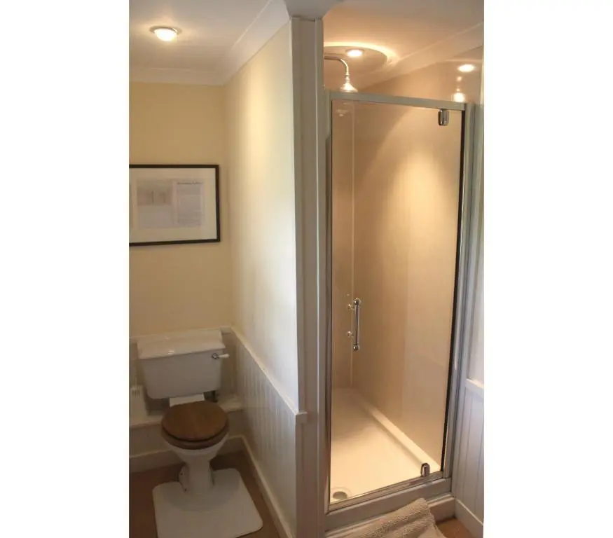 a shower stall in a bathroom with a toilet at The Annex - Easter Arr in Auldearn